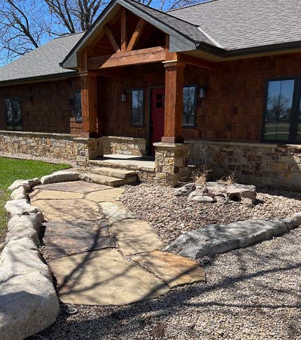 front stone walkway and wall of cabin