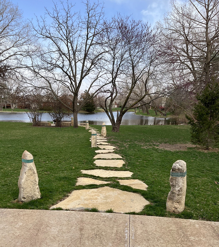 natural stone walkway with art installation